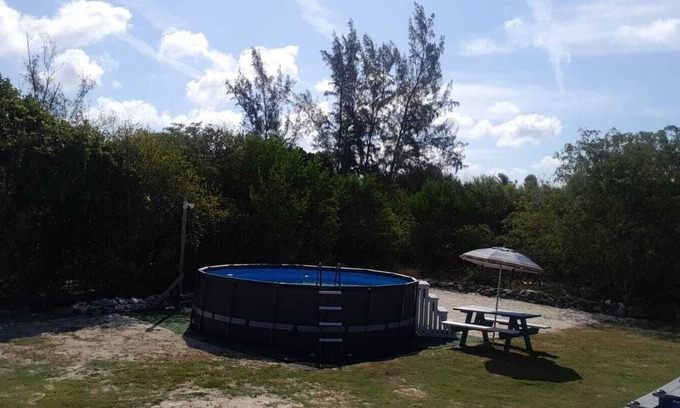 Farmer's Hill House | Centrally located family oriented near grocery store, airport, and beach