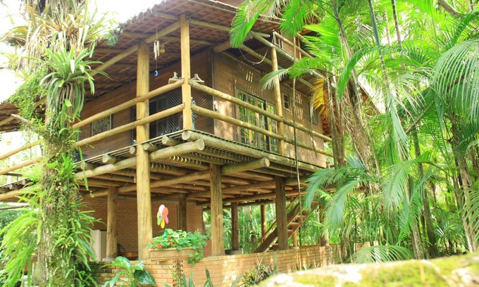 Antonina House | Chacara with incredible house on the edge of the river in Antonina, PR -