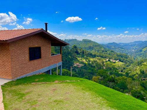 Goncalves Ski Chalet | Chalé 2 hidromassagem lareira e cozinha