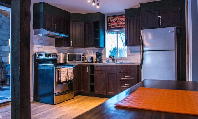 Saint-Calixte Cottage | Chalet et spa : Le Baron