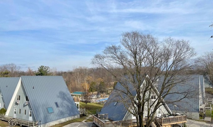 Stevensville House | Chalet on the Lake 39 w/Beach Access, Pools, Sport Courts, Fishing Pond & more!