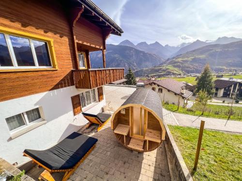Acletta Apartment | Chalet Viola am Waldrand von Disentis