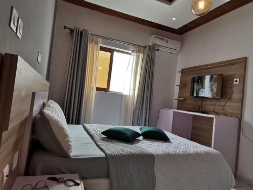 Limbe Apartment | Chambre de luxe chez FOUR IN ONE Résidence