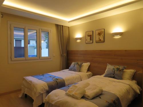 Bondy House | Chambre deux lits séparés