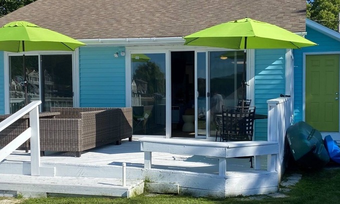 Muskegon Heights Cottage | Charming 2-bedroom waterfront cottage with AC & WiFi located in Norton Shores.
