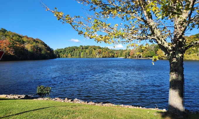 Newland House | Charming 2-bedroom house on the river with resort amenities, plus golf course!