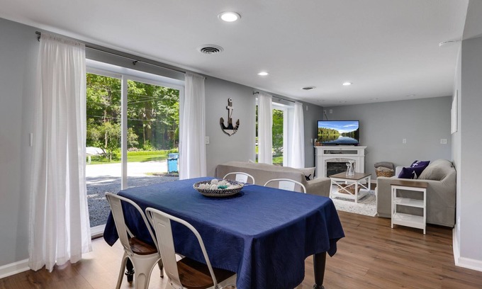 La Porte House | Charming 3-bedroom coastal, central, cozy house across from Pine Lake