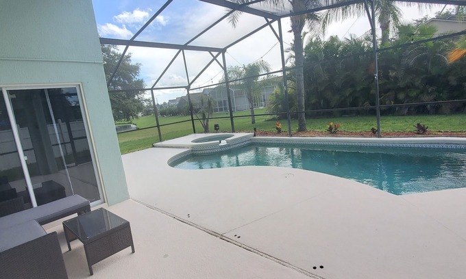Crescent Lakes House | Charming 3-bedroom house with WiFi, AC, Pool, Lake View, by Disney.