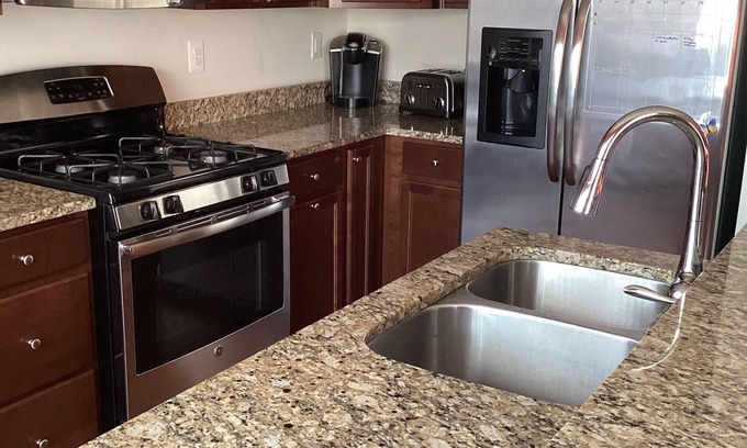 Laurel House | Charming 3-bedroom townhome with WiFi, AC, & Community pool in serene Laurel, Md