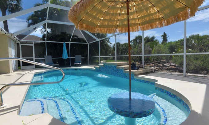 Long Meadow House | Charming 3-bedroom house with AC,WiFi and HEATED POOL in welcoming Rotonda West