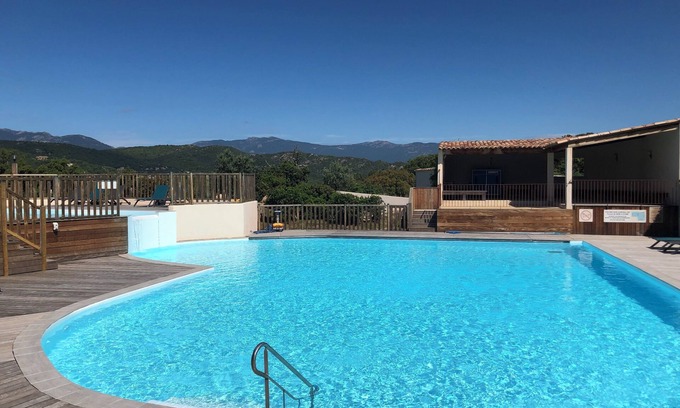 Santa Giulia Apartment | Charming 3-room garden apartment with 300m2 swimming pool