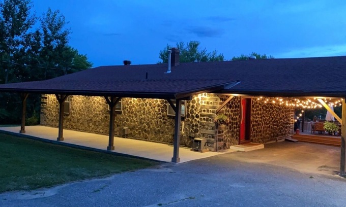 Whitewater Region Cottage | Charming 4 Season Log Lake House w/ Hot Tub located in the Whitewater Region