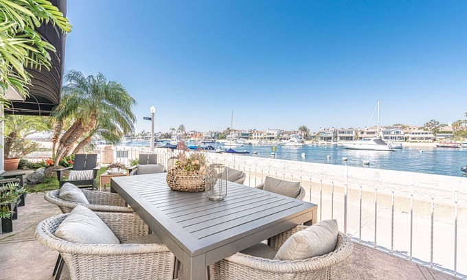 Balboa Island Condo | Charming 5BR Mid-Century Bayfront Retreat with Floor-to-Ceiling Windows!