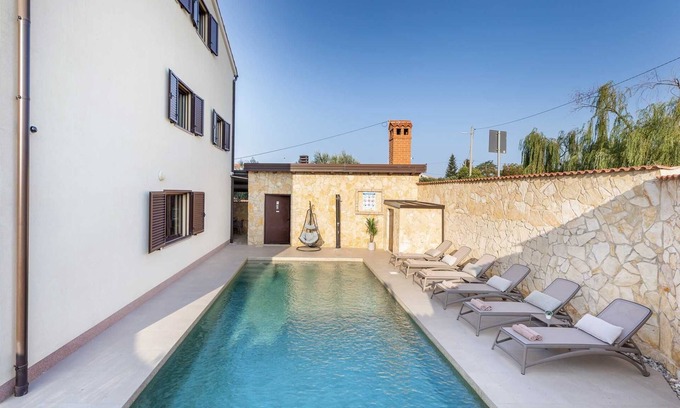 Loborika Villa | Charming 6-BR Villa for 12 with a pool, Dual Living Areas, 5 Parking Spaces
