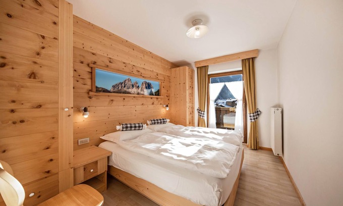 Campitello di Fassa Apartment | Charming Apartment “Eurochalet- S4” close to the Ski Lifts with Mountain View, Wi-Fi, Balcony and Terrace; Parking Available