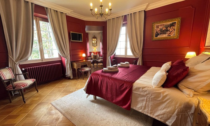 Saint-Genest-Lerpt Bed & Breakfast | Charming bed and breakfast at the château with breakfast included.