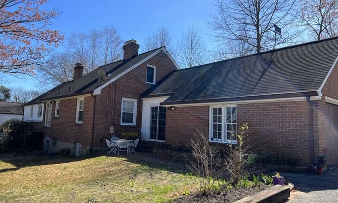 Hollins House | Charming brick ranch with an acre of beautiful garden