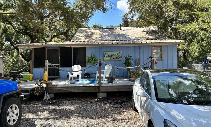 Grand Isle Cabin | Charming cabin among the oaks of Grand Isle
