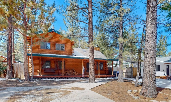 Woodlands Cabin | Charming cabin with wood-burning fireplace, private yard, porch, & W/D