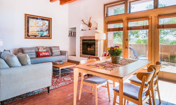 Nambe Pueblo Apartment | Charming condo with fireplace, patio, grill, W/D, & pool - quiet location