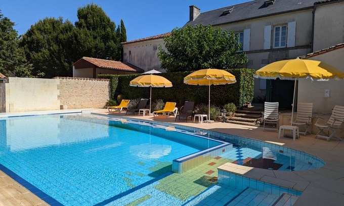 Saint-Cybardeaux Cottage | Charming Cottage with Pool, Fireplace, and Garden in Vineyard Estate