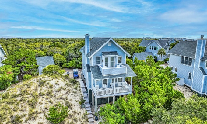 Flora's Bluff House | Charming cottage nestled high on the dune ridge w/both clubs!