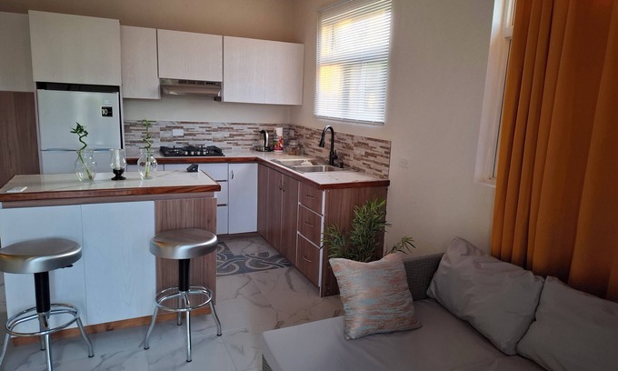 West Coast Apartment | Charming cozy 1-bedroom apartment in fabulous Cottage St. George with WiFi, AC