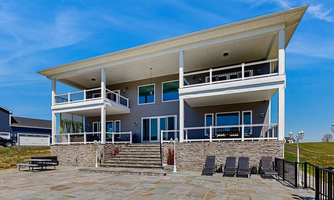 Orange House | Charming dog-friendly lakefront villa with private dock, firepit, stunning views