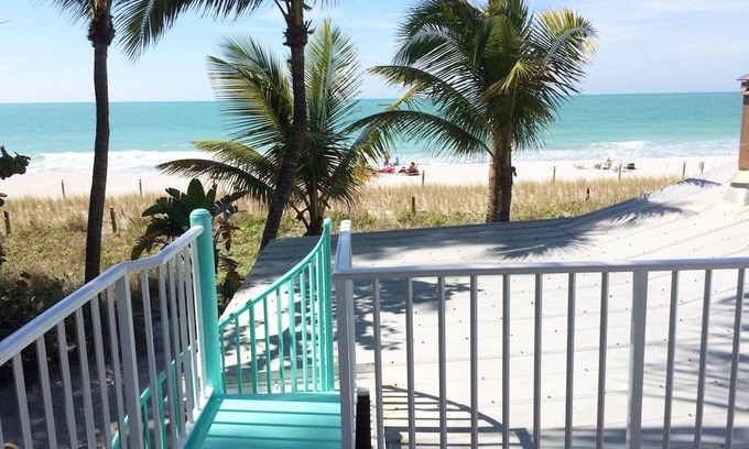 Captiva Cottage | Charming, First Class, Fenced and Gated, Truly Beachfront! Golf cart included.