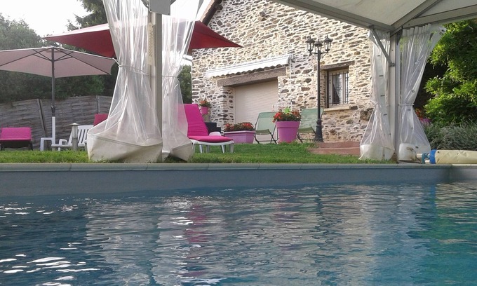 Sarlande Cottage | Charming gîte 30° indoor pool Jacuzzi Sauna. Electric charging station