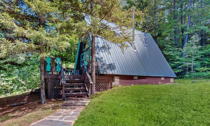 West Townshend House | Charming gingerbread A-frame situated on 3 acres, woodstove, A/C, deck