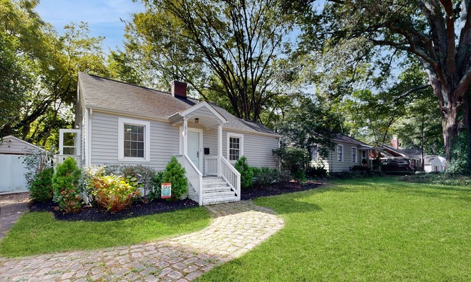 Charlotte House | Charming House with Cozy Patio and Firepit for Relaxing Evenings