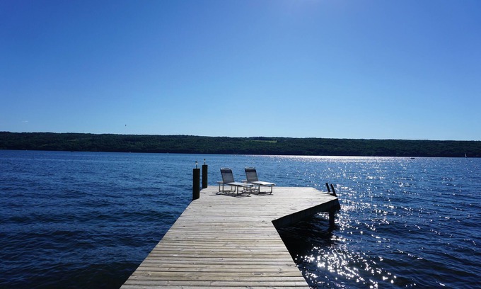 Burdett Cottage | Charming lakefront cottage with private beach and boat dock.