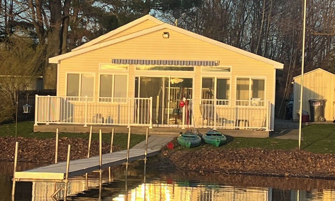Grant Cottage | Charming lakeside cottage on all-sports lake with private beach & dock