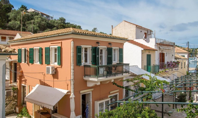 Lakka House | Charming Lakka Retreat: Angelina Apartment with A/C and Central Square Balcony
