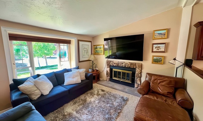 Millcreek House | Charming Mountain Retreat with Enclosed Backyard and Artistic Flair