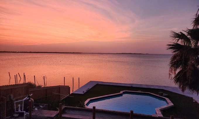 Flour Bluff House | Charming Oso Bay waterfront 3bdrm house WiFi AC Pool near Padre Island Beaches