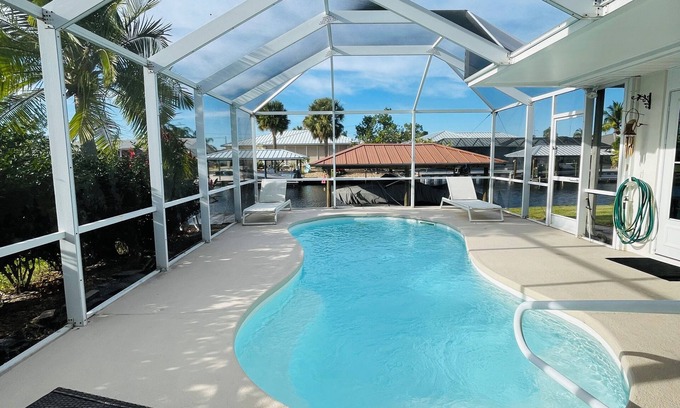 Lake Placid House | Charming Pool Home with canal access to Lake June! 20% Mobile Booking Discount!