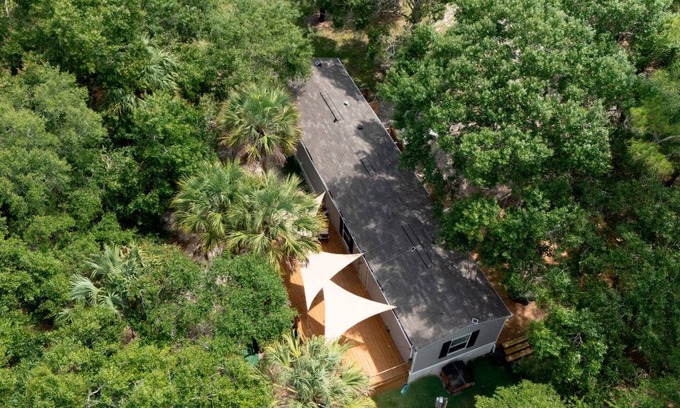 Clewiston House | Charming retreat with fire pit, games, and space for up to 5 guests. Book today.