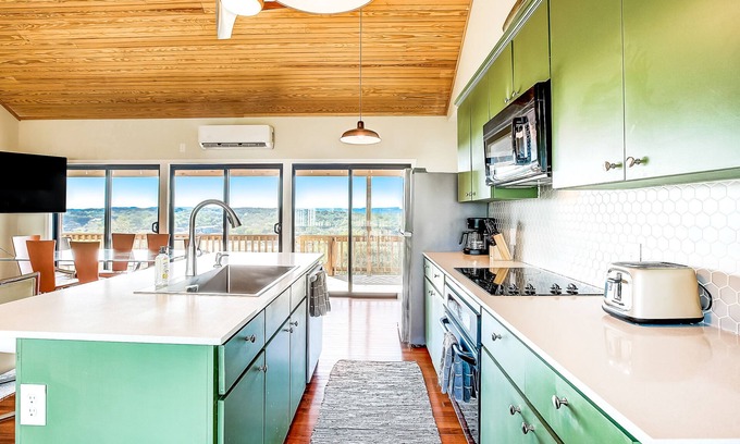 Spicewood House | Charming, river view home with a furnished deck, central AC, & full kitchen