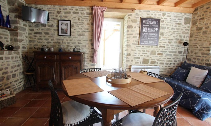 Annoville Cottage | Charming Stone Cottage Near Beach with Private Garden, Wi-Fi, and Pet-Friendly