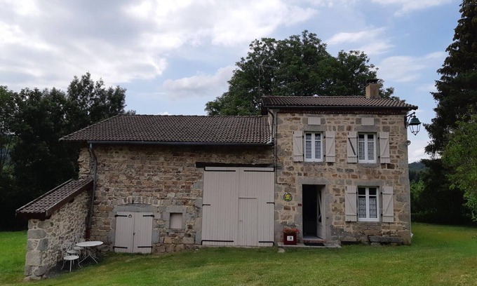 Lavoine Cottage | Charming Stone Cottage in Lavoine with Wood Stove, Garage, and Garden