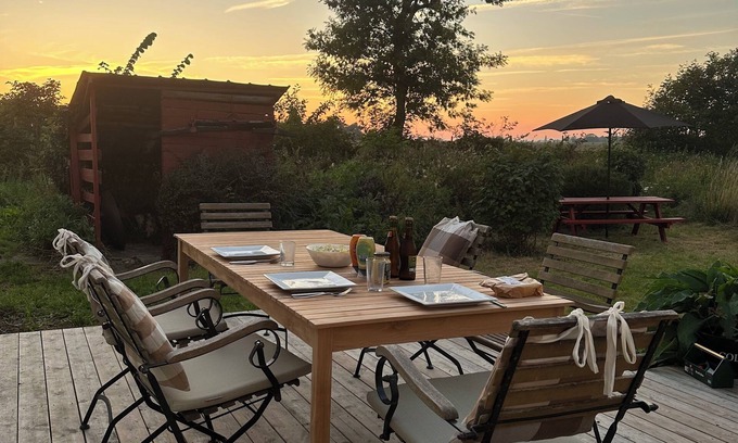 Nakskov House | Charming summer house with thatched roof and large garden. Pet friendly!