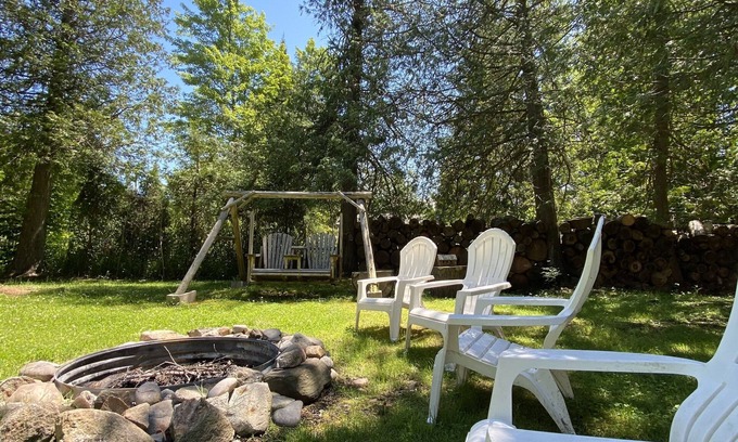 Alanson House | Charming Up North River Cottage