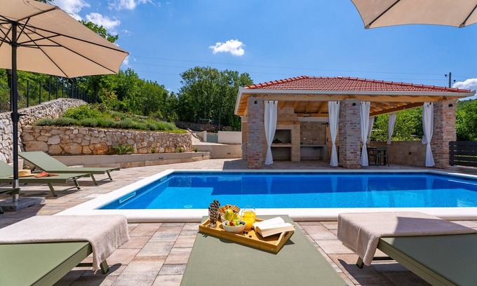 Primorski Dolac Villa | Charming Villa Domus Alba for 6+2 Guests with heated Pool, Sports Area & Outdoor Dining – A Private Escape Surrounded by Nature, just 24 km from Trogir and sea