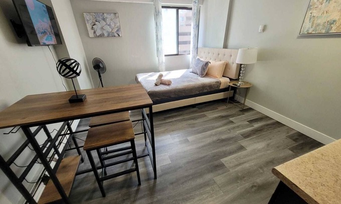 Eau Claire Apartment | Charming Vintage Studio Escape in Downtown Calgary