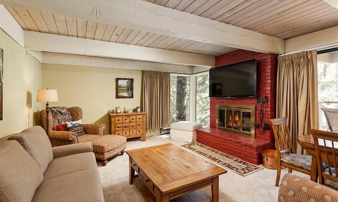 Aspen House | Chateau Eau Claire Unit 22, Condo Overlooking the Roaring Fork River with a Private Deck