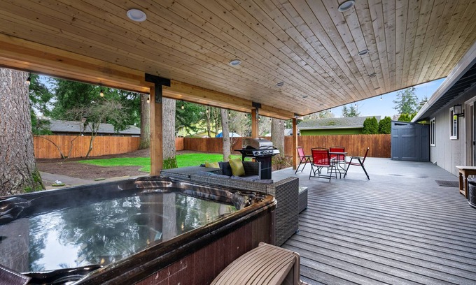 Evergreen House | Cheerful 4 bedroom home one level with hot tub and park like feel