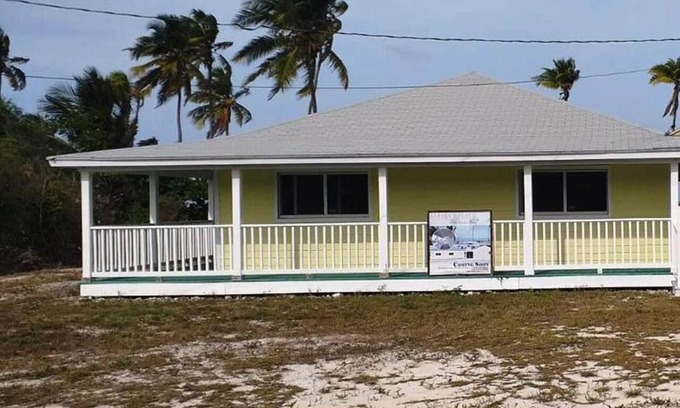 Mars Bay Settlement Villa | Cheerful one bedroom villa with a patio.