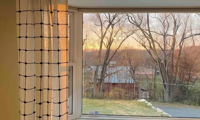 Council Bluffs House | Cheerful two bedroom home in quiet neighborhood. Sun Porch ~ Patio ~ Large yard